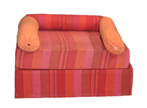 Orange and pink low seating with arm cushions